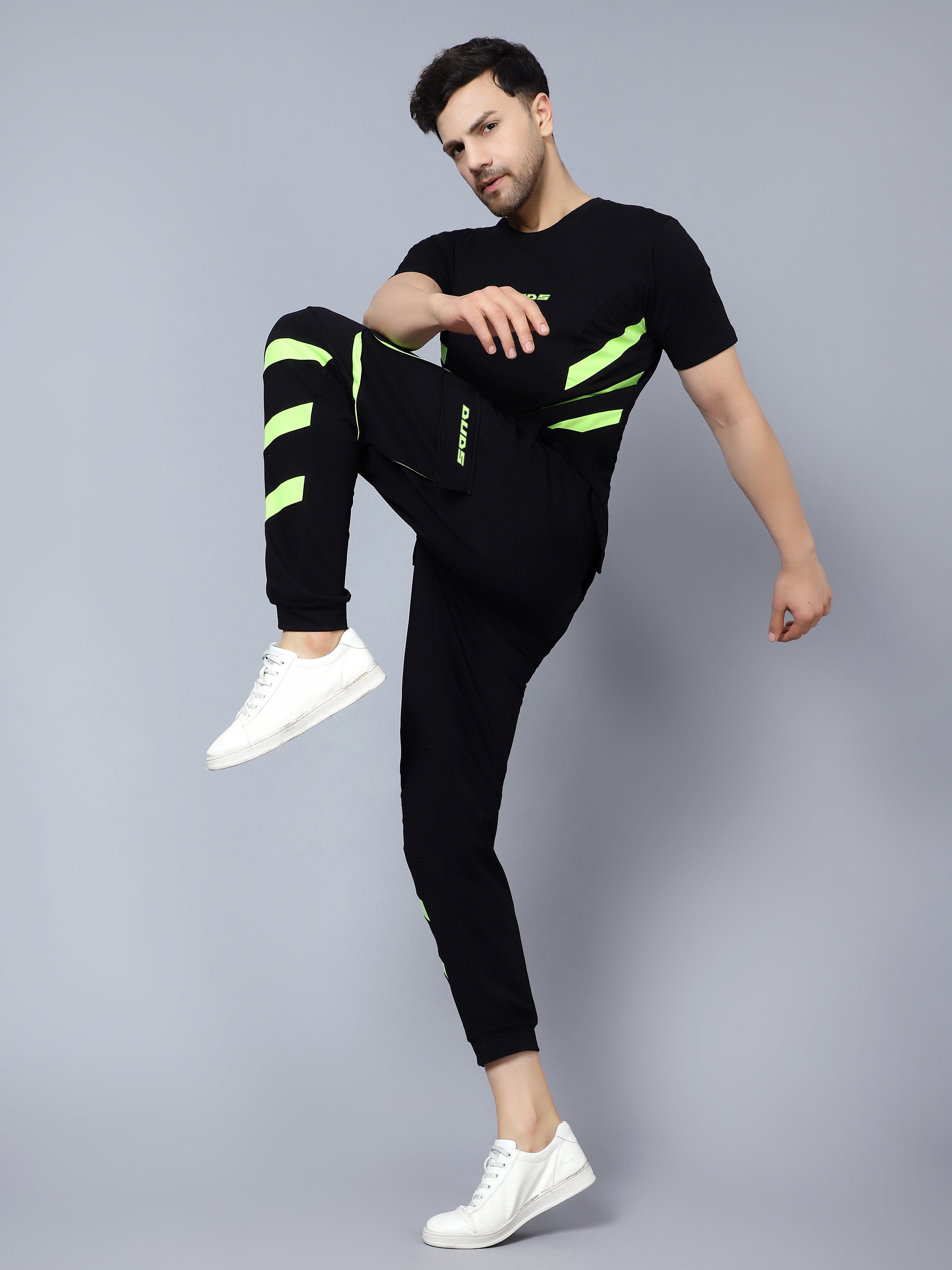 Black and neon green best sale track pants